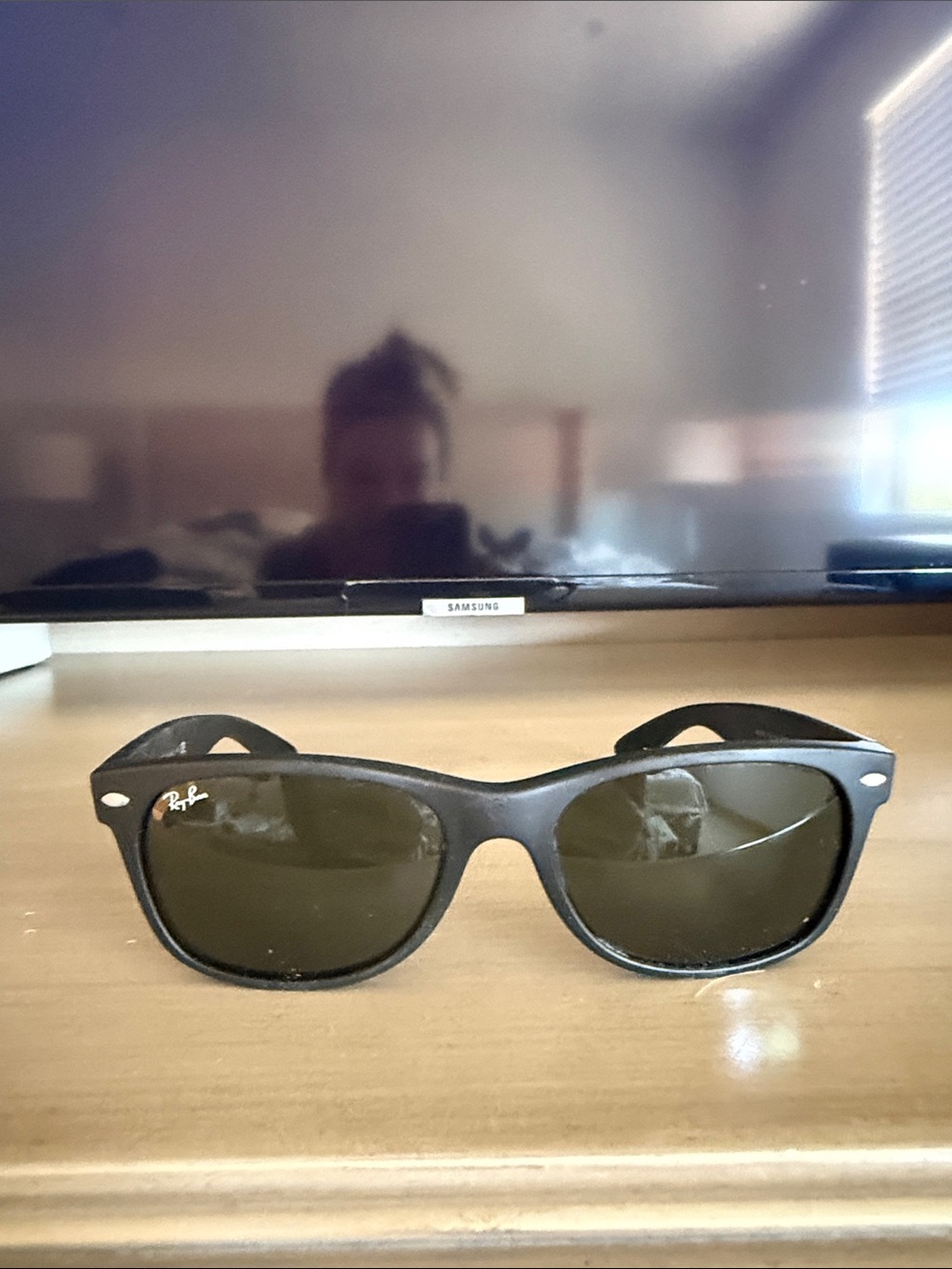 Ray-Ban Black Frame Sunglasses with Dark Green Lenses